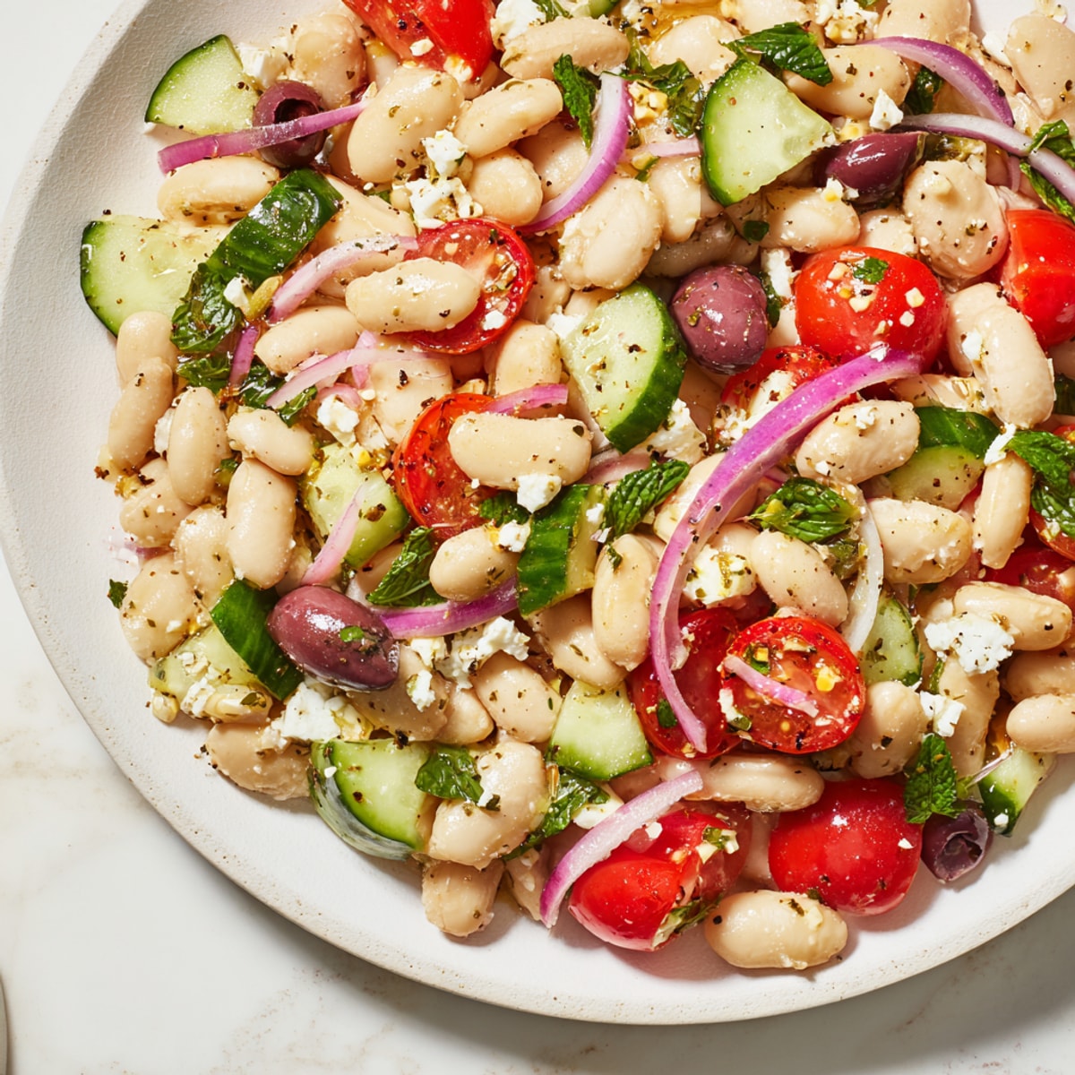 Creamy, lemony Mediterranean White Bean Salad recipe with Feta, perfect for light lunch.