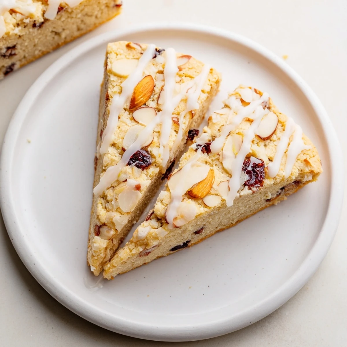 Enjoy a taste of homemade goodness with these buttery, almond-infused Cherry Almond Shortbread Wedges, perfectly baked.