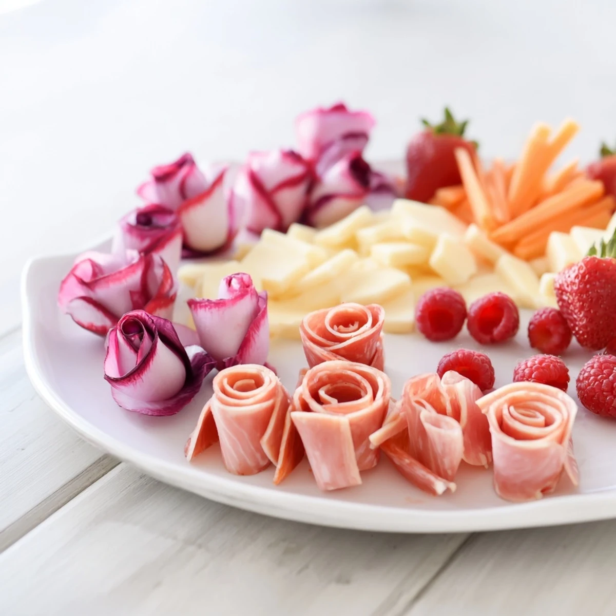 Elegant Pink Petal Watercolor Wash platter, featuring vibrant pink veggies and cured meats, ready to serve.