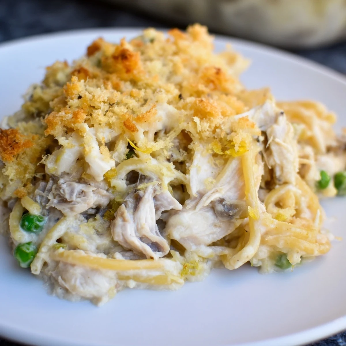 Golden-baked Turkey Tetrazzini dish, a creamy comfort food with tender chicken and melted cheese, ready to serve.