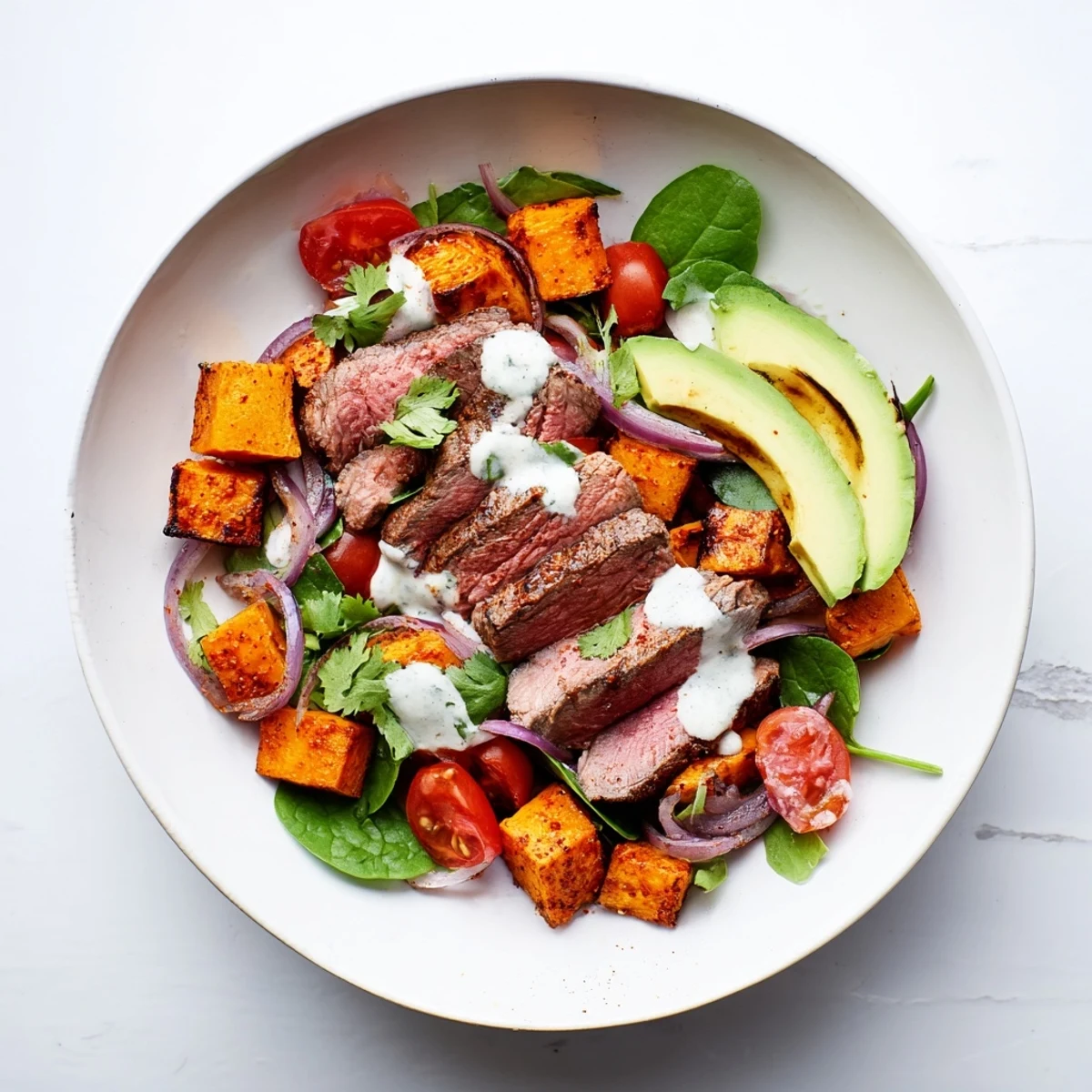 Beef Avocado Sweet Potato Bowl with tender beef, creamy avocado, and roasted sweet potatoes for a flavorful meal.