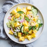 Bright, tropical Viral Pineapple & Cucumber Salad with a zesty lime dressing and fresh cilantro, visually appealing.