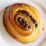 Buttery, flaky layers of croissant embrace rich cookie dough in these irresistible homemade crookies.