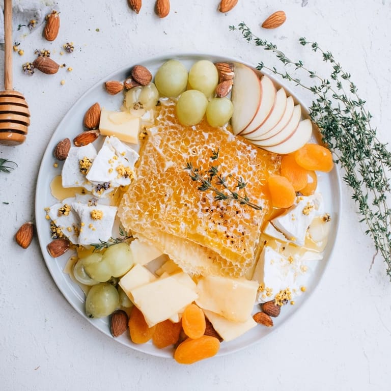 A colorful assortment for the easy Busy Bee Honeycomb Snack Plate, ready for a sweet and savory bite.