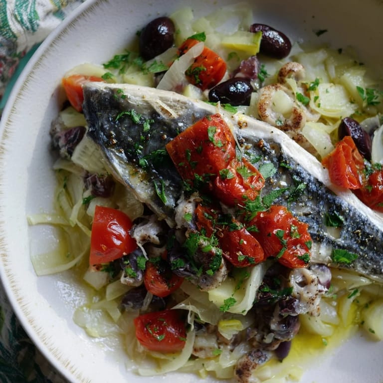 Delectable Plongeons dans lOcéan Poisson Bleu: a French seafood masterpiece with lemon, herbs, and tender fish.