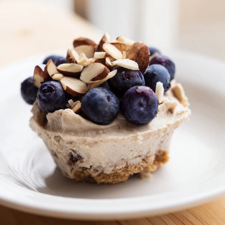 These creamy protein cheesecake cups offer a delicious, healthy snack, ready after chilling.